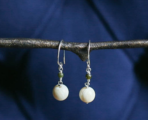 Mammoth with Jade Earrings