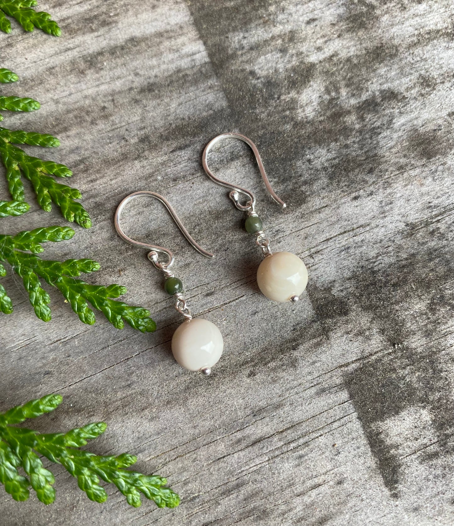 Mammoth with Jade Earrings